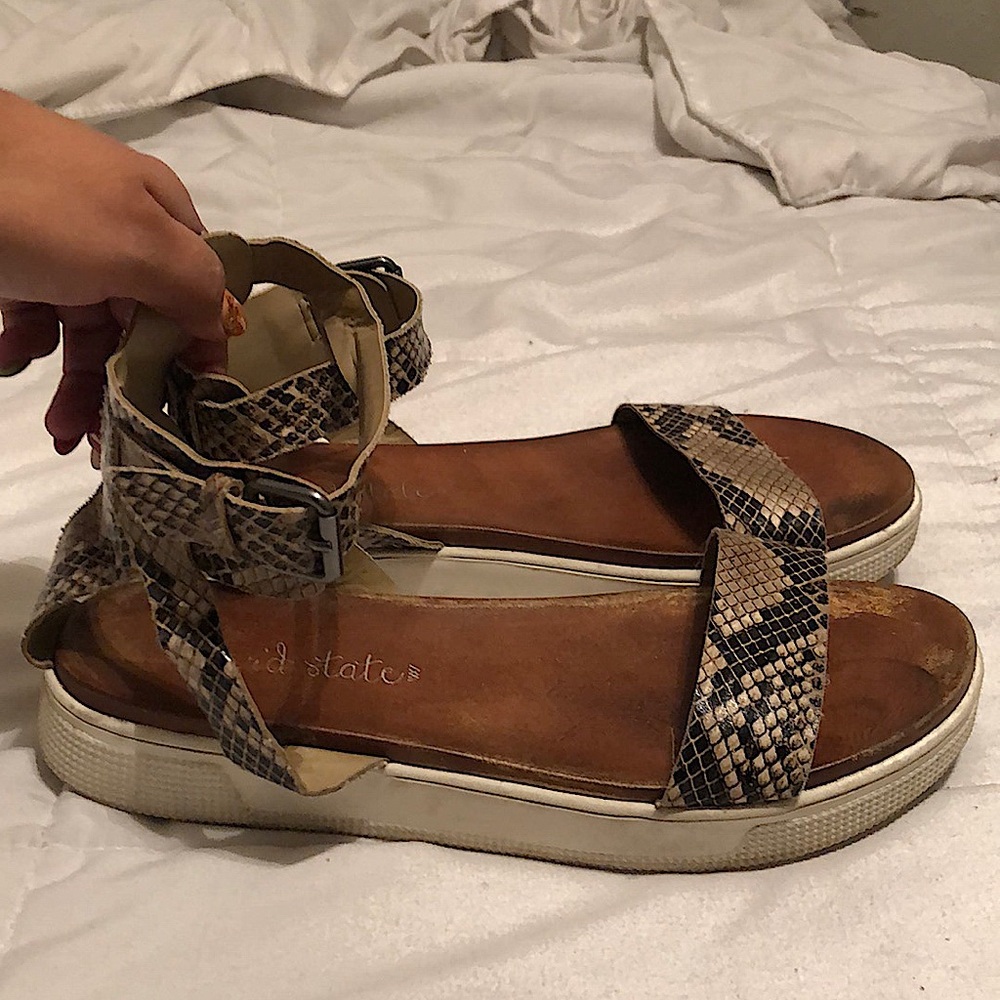 Altar’d State Platform Sandals. Used but still in very good condition.